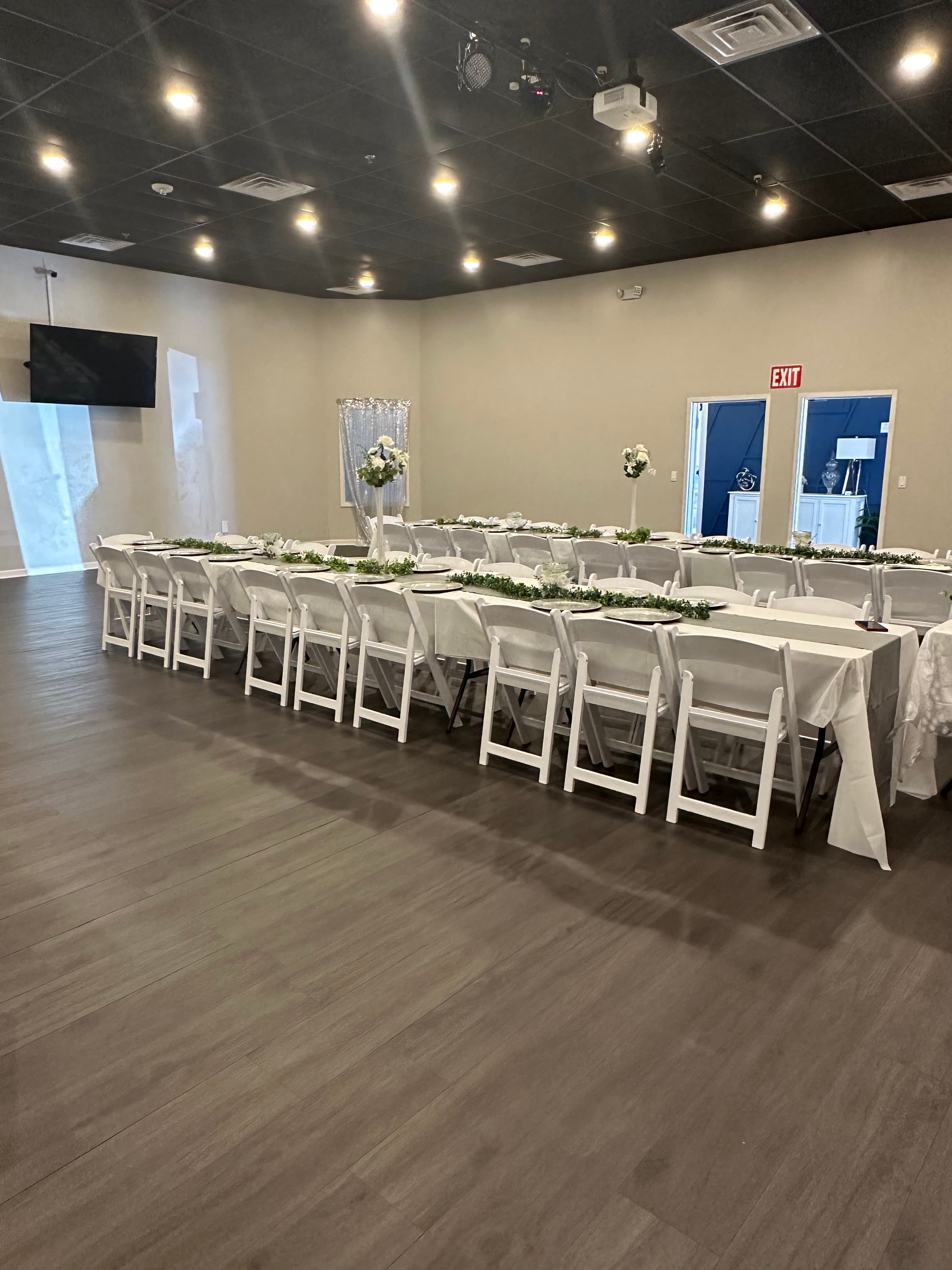 Elegant wedding reception setup showcasing customizable table arrangements and venue layout at The Cove
